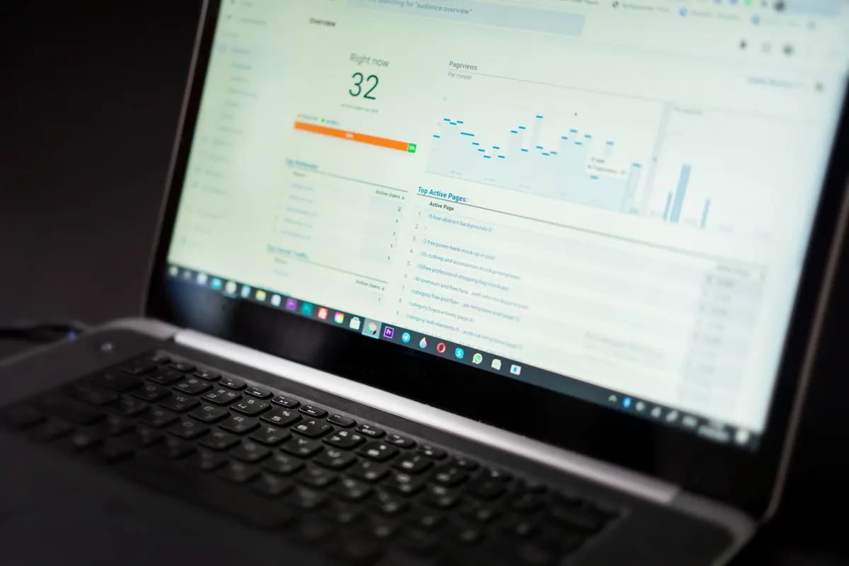A laptop showing an analytics dashboard, representing preserved SEO rankings after migration