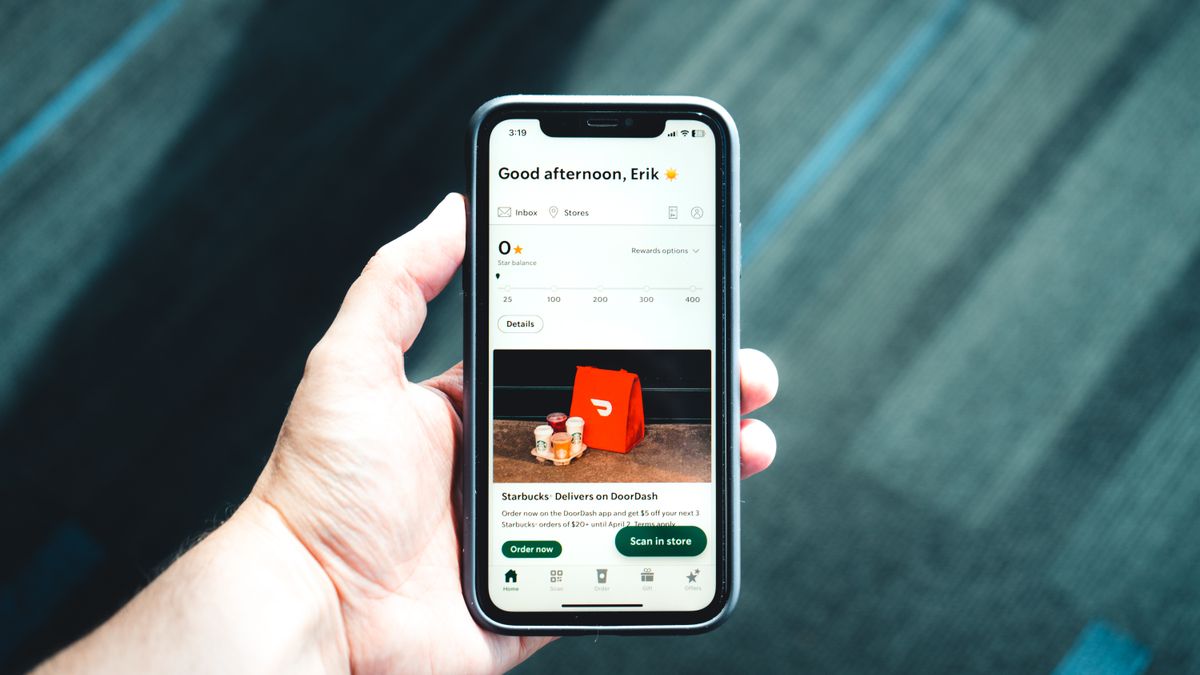 A clean, modern business website displayed on a smartphone screen